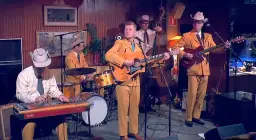 Countrymusik i stadsmiljö på klubb Grand New Opry