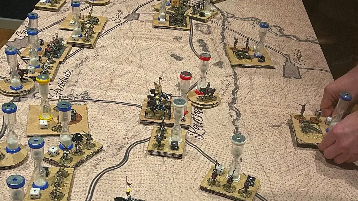 MINIATURES, MANAGERS & MAYHEM